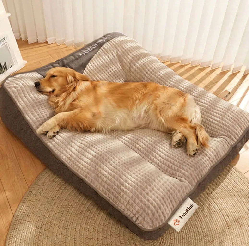 Orthopedic memory foam dog bed with Dooties fabric tag on front edge